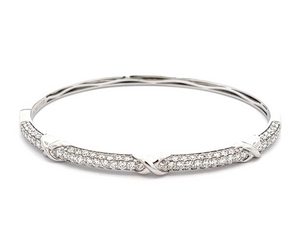 This easy to stack and style bangle features 88 pave-set round bril...