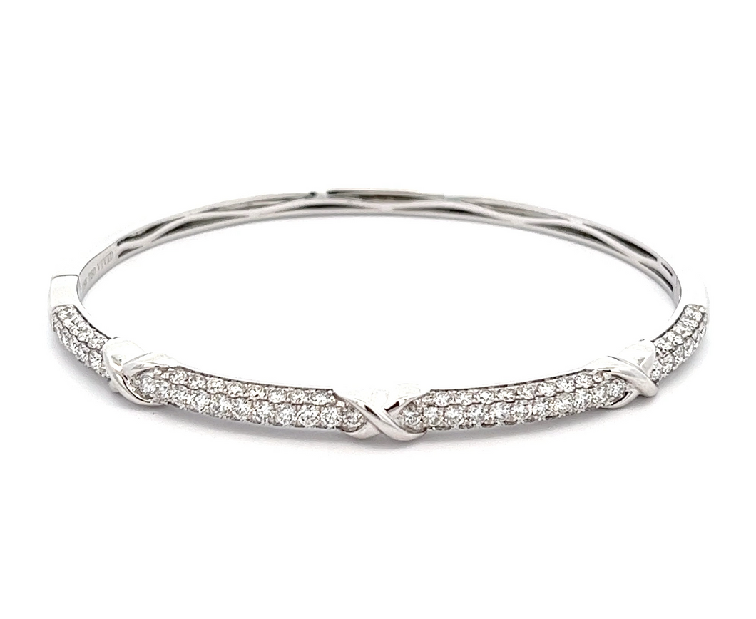 This easy to stack and style bangle features 88 pave-set round bril...