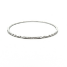 This easy to stack and style 18k white gold bangle features pave-se...