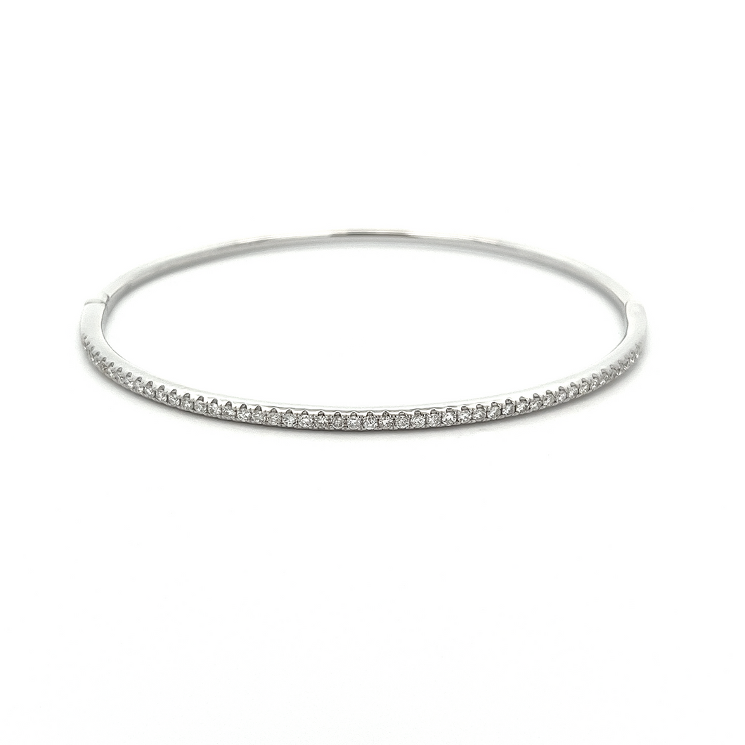 This easy to stack and style 18k white gold bangle features pave-se...