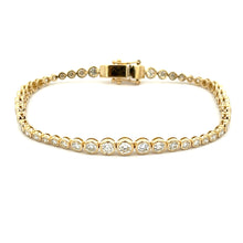 This easy to style bracelet features bezel-set round brilliant cut ...