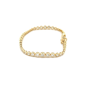 This easy to style bracelet features bezel-set round brilliant cut ...