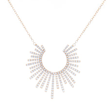 This stunning necklace features pave-set round brilliant cut diamon...