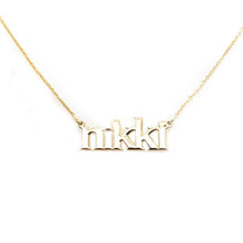 14k yellow gold NIKKI nameplate.