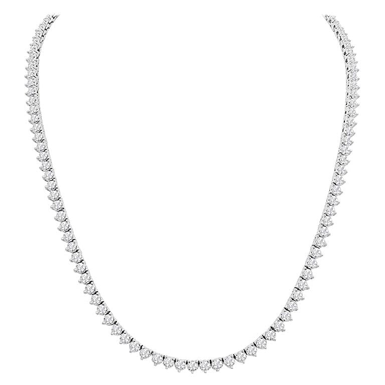 This diamond tennis necklace features round brilliant cut diamonds ...