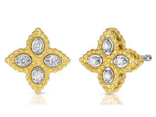 These earrings from Roberto Coin feature round brilliant cut diamon...