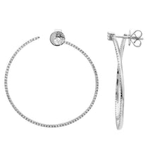 These hoop earrings feature pave set round brilliant cut diamonds t...