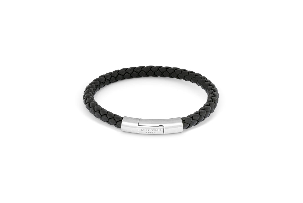 








The tightly woven, black, Italian leather bracelet is crea...