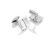 















 These cufflinks feature a white mother of pearl ce...