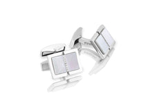 















 These cufflinks feature a white mother of pearl ce...