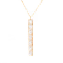 this sleek stick pendant features 87 pave-set diamonds totaling .27ct