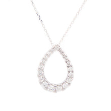 this tear drop shape pendant features diamonds totaling .50ct