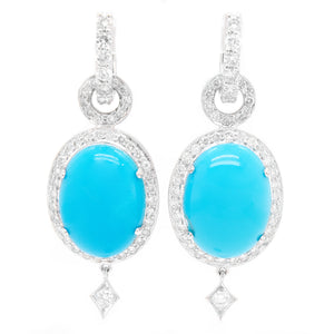 These gorgeous drop earrings feature oval turquoise stones at the c...