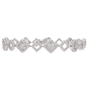 This stunning bracelet features 9 princess cut diamonds totaling 2....