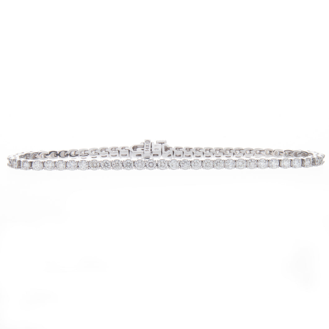 A classic tennis bracelet with 63 diamonds totaling 3.27ct