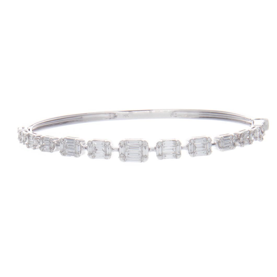 This stunning bangle features 66 baguette cut diamonds totaling 1.4...