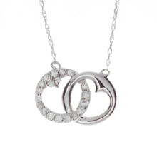 This necklace features a small double heart pendant attached to the...