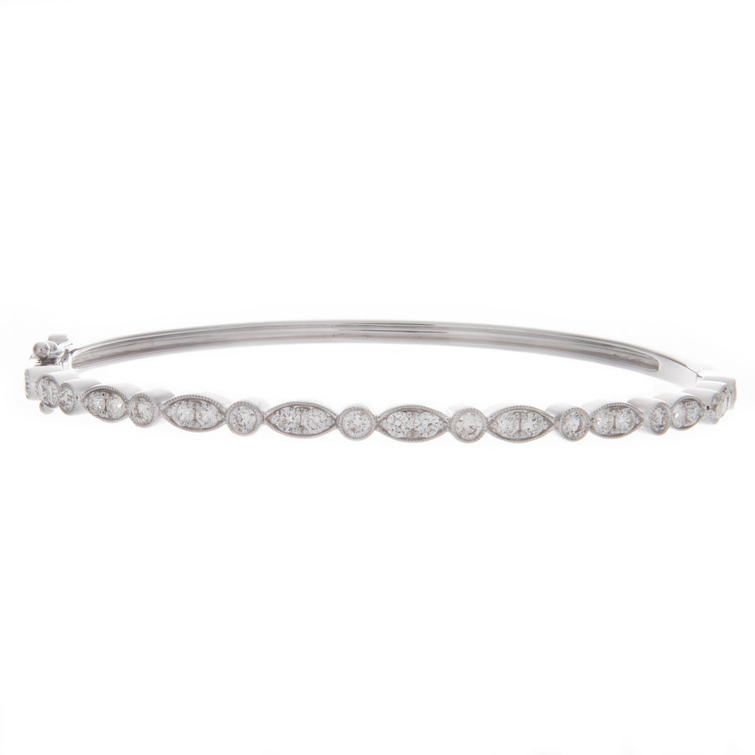 this marquise style bangle features 28 round brilliant cut diamonds...