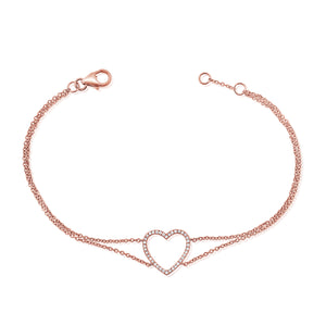 This heart bracelet features round brilliant cut diamonds that tota...