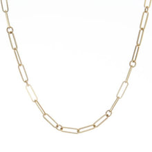 This 18k yellow gold link chain necklace features a gold disk penda...