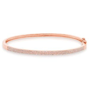 This bangle features pave set round brilliant cut diamonds that tot...