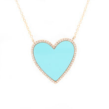 This colorful 14k yellow gold statement necklace features a turquoi...