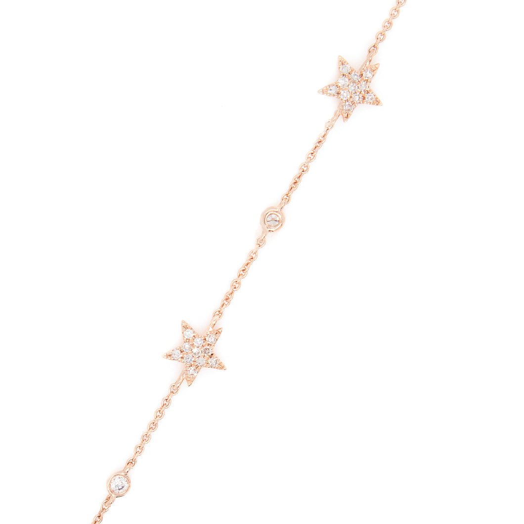 This sweet bracelet features 5 rose gold stars with pave-set diamon...