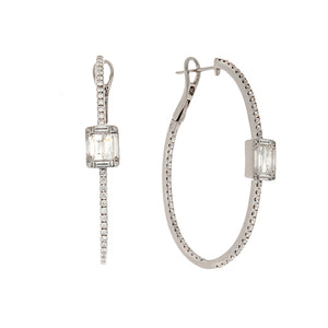 These unique hoop earrings feature round brilliant cut diamonds as ...