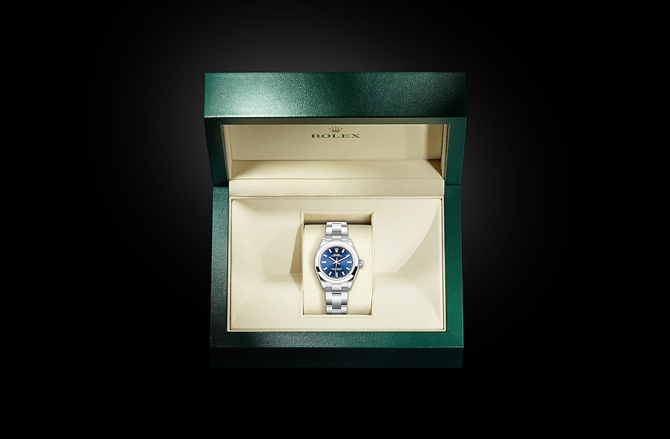 Pre - Owned ROLEX Oyster Perpetual 41 with a bright blue dial and an Oyster  bracelet M124300-0003 Complete