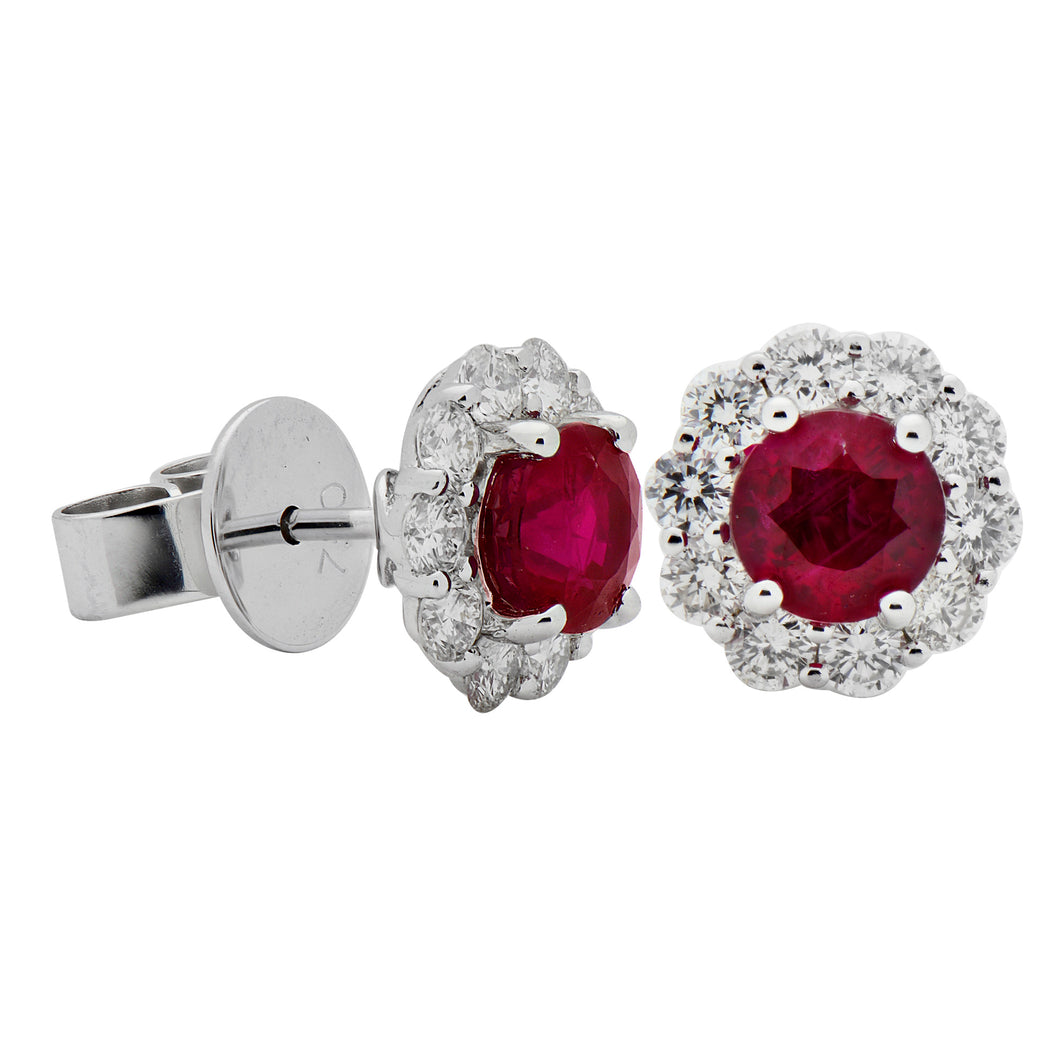 center rubies are 1ct, with sorrounding diamonds totaling .62ct