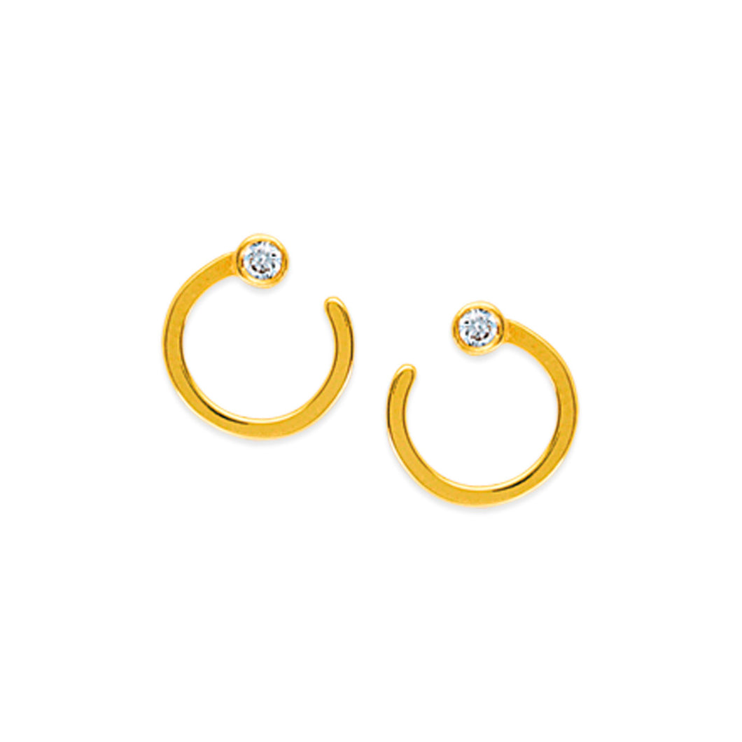 These diamond earrings feature two bezel set diamonds that total .0...